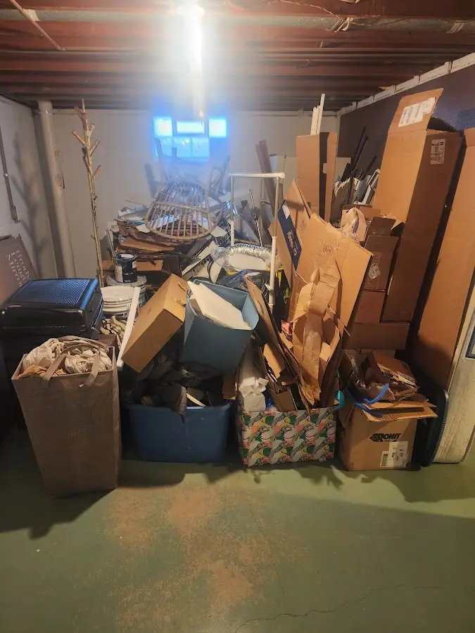 Roll-off dumpster container at job site for 4 Yard Dumpster Rental in Brookhaven